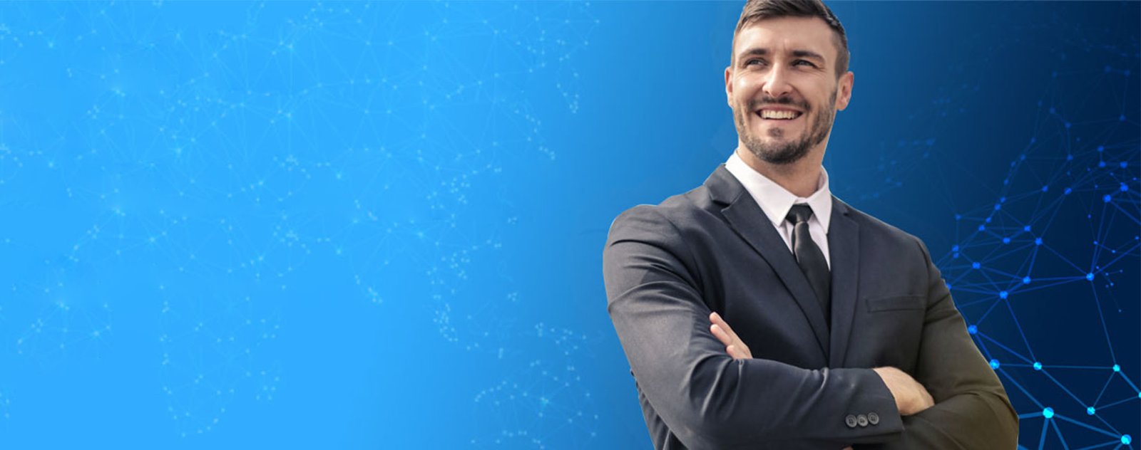 close up of a business man smiling with a blue background